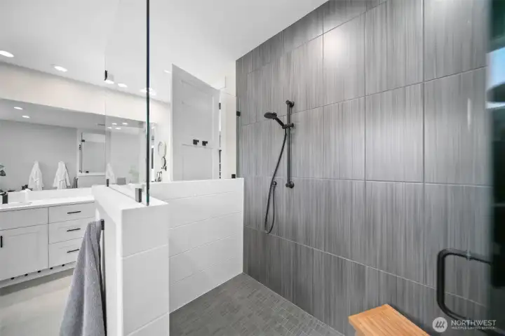 Shower with dual showerheads, offering a luxurious and customizable showering experience.