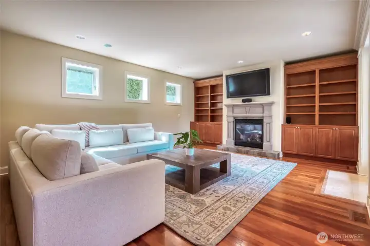 Family room with French Doors to the patio garden.  TV conveys with sale.