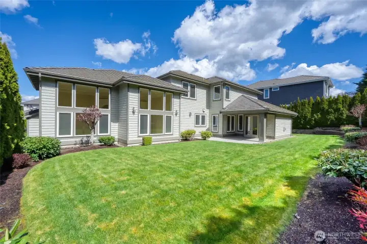 Large, flat lot with a private backyard offering great space for entertaining.