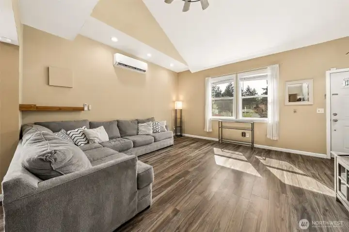 Lounge in the living room in this open concept home.