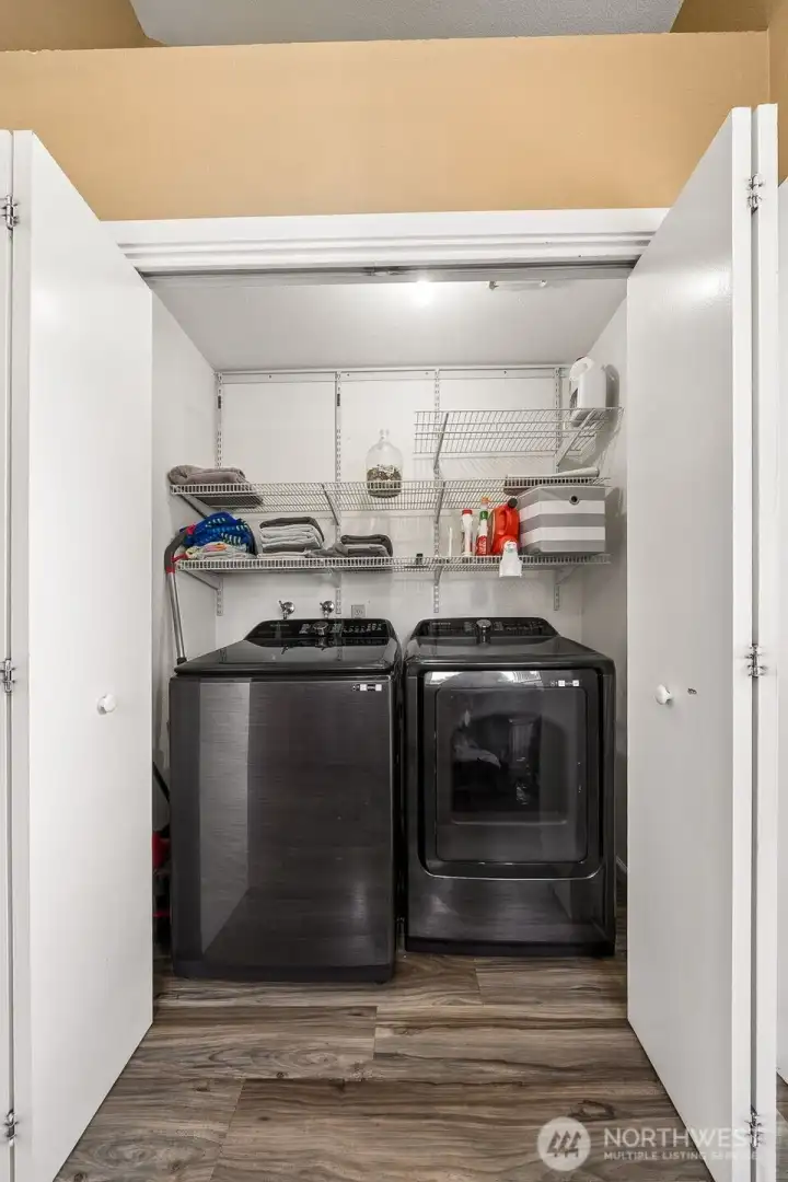 Utility closet in the kitchen area.