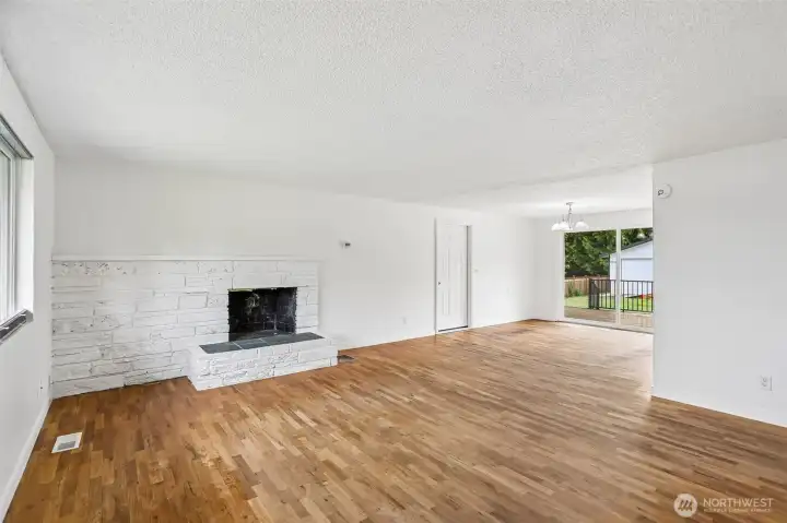 Living room with wood fireplace Living room with wood fireplace