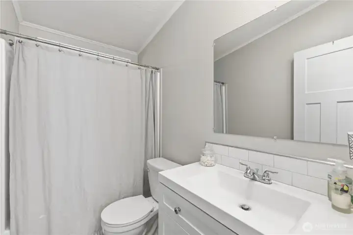 The guest/2nd bathroom has generous storage, as well as a full bath/shower combo. The guest/2nd bathroom has generous storage, as well as a full bath/shower combo.