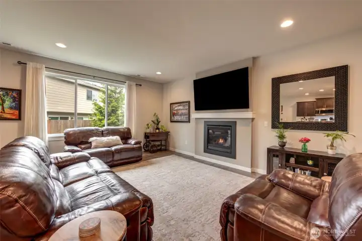 The living room is spacious and made cozy by the gas fireplace. The living room is spacious and made cozy by the gas fireplace.