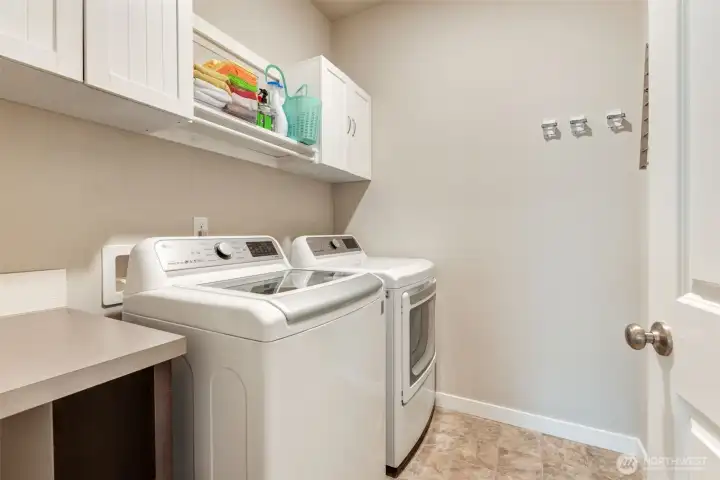 Main floor utility room with washer and dryer that stay! Main floor utility room with washer and dryer that stay!