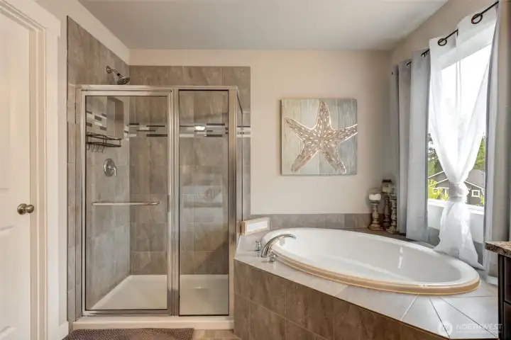 Wash the day off or soak it in - this primary bathroom does not disappoint! Wash the day off or soak it in - this primary bathroom does not disappoint!