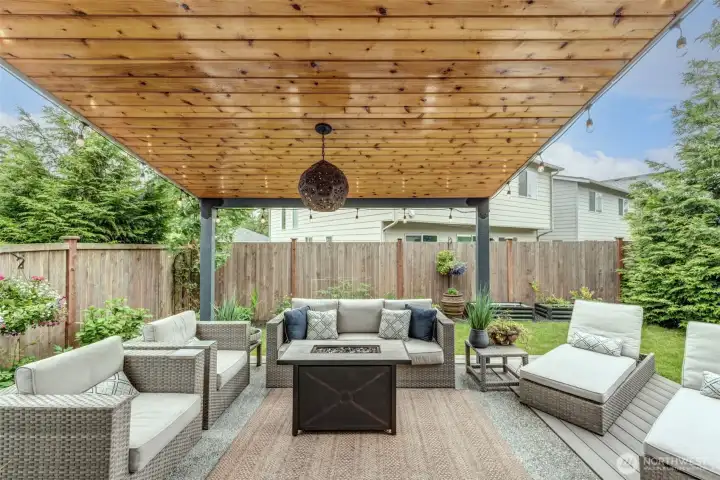 WOW!! Custom built, wood planked covered patio. WOW!! Custom built, wood planked covered patio.