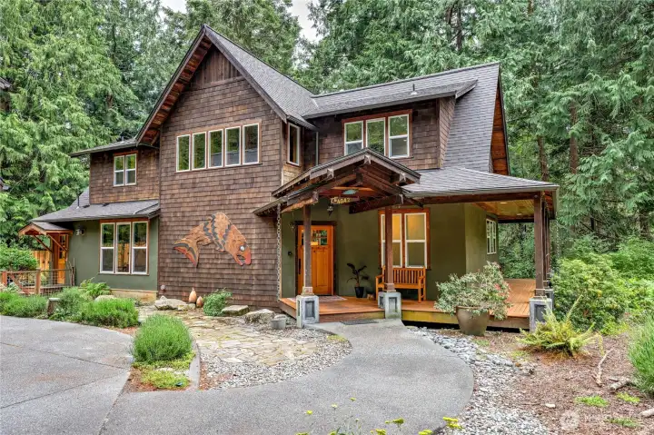 Main home with a custom salmon art installation.