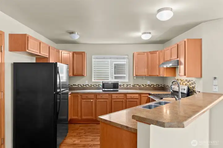 Large open kitchen with eating bar
