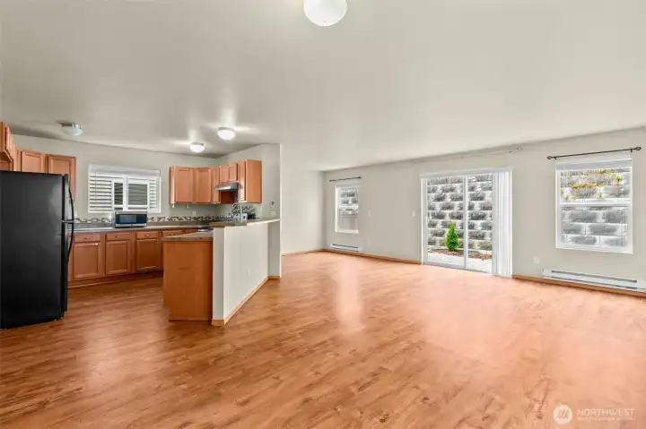 Laminate plank flooring throughout the main level