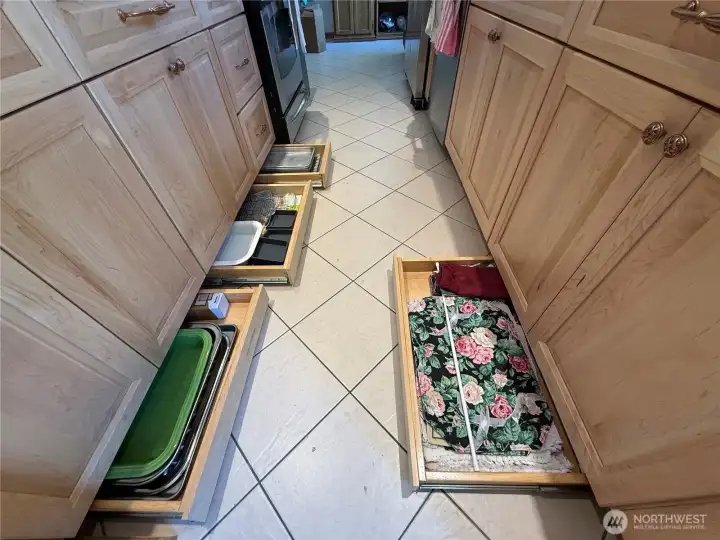 Toe kick drawers are under each cabinet, except for under the sink.