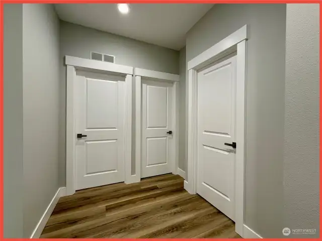 Enter another hallway to the additional 2 bedrooms and a full bathroom.