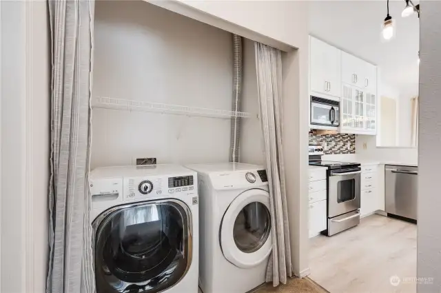 Full sized washer and dryer area off the kitchen.