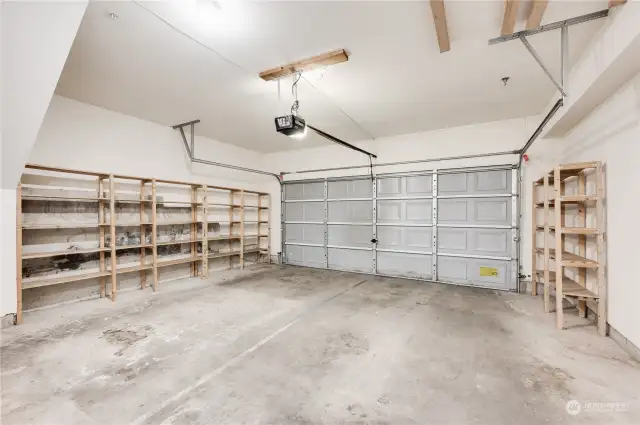 Large two car garage with room for storage. The ceilings are high enough you could add hanging storage if needed.