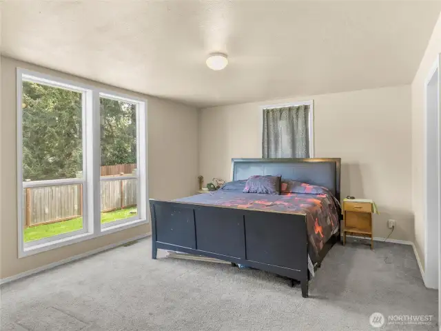 Primary bedroom is spacious to accommodate that King size bed plus more!