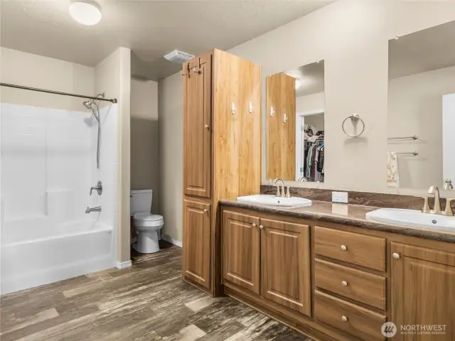 Incredible storage in this ensuite bathroom.  What is not shown is the massive walk-in closet on the far wall
