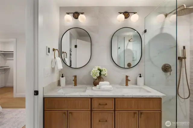 Double vanity and heated floors in primary bathroom