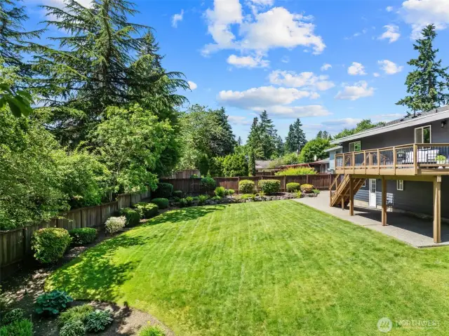 Fully fenced w/beautiful low maintenance landscaping