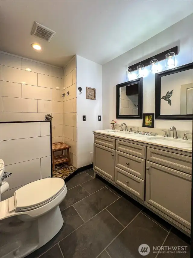 Primary Ensuite Bathroom with double sinks