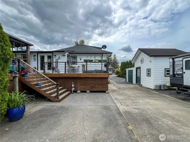 Driveway extends the length of the property providing plenty of room for parking. There is Morton St access as well as alley access.