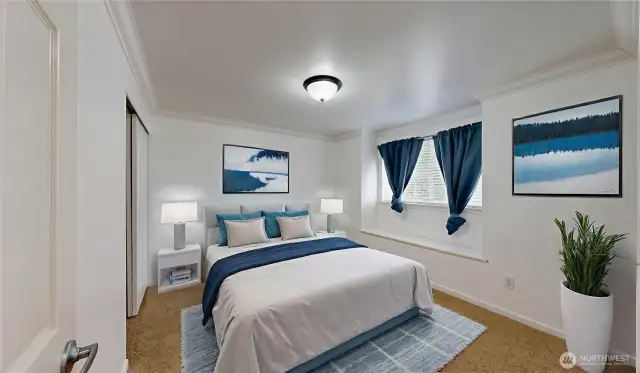 Second bedroom with a view of the greenbelt. Photo is virtually staged.
