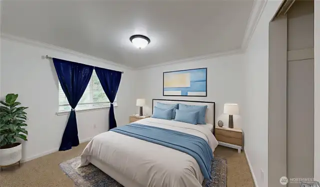 Fourth bedroom with a view of the greenbelt. Photo is virtually staged.