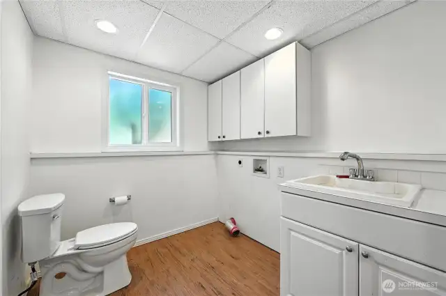 Utility/washroom with hafl bath on lower level