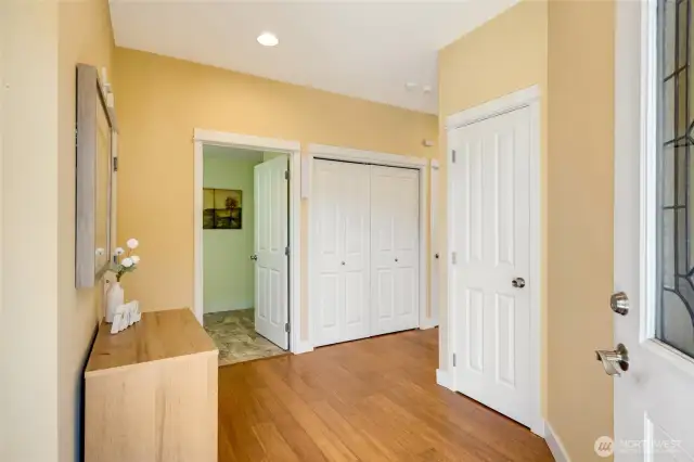 Welcoming front entryway featuring heated floors and natural light—entry to this ground-floor Kent condo feels like home.