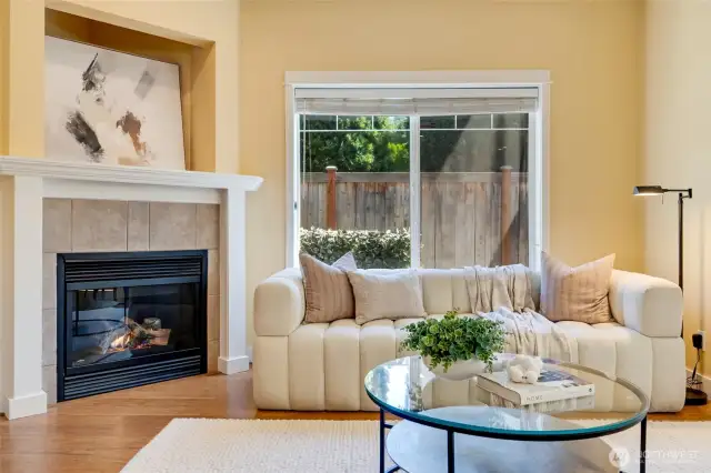 Cozy fireplace adds warmth and ambiance to this Kent ground-floor condo—ideal for fall and winter evenings.