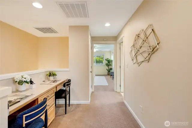 Versatile upstairs landing with built-in desk space—perfect for a home office, study nook, or remote work setup in this Kent WA condo.