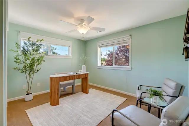 Bedroom 2 with large windows and versatile layout—great for use as a guest room, home office, or creative studio in Kent WA.