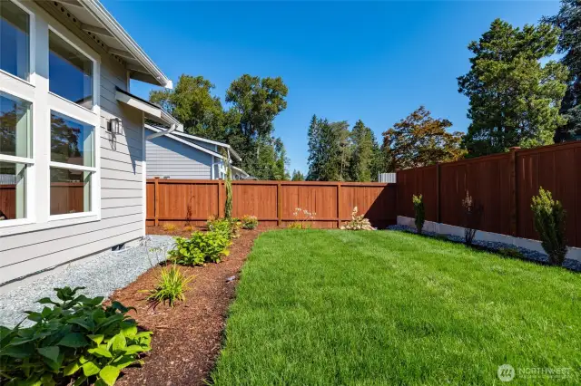 There is a fully fenced back yard.