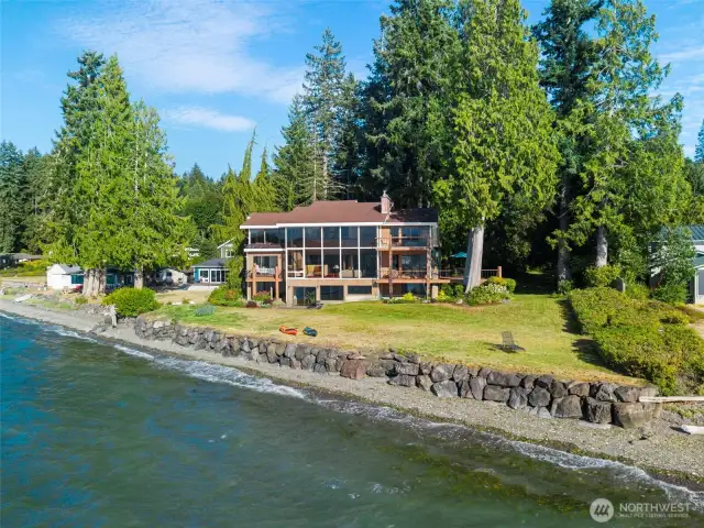 A waterfront sanctuary set against the backdrop of the Hood Canal, Olympic Mountains and lush Pacific Northwest landscape.