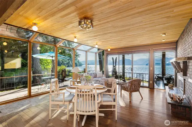 A look at the solarium skywall area at eh nook and  family room allowing the outside to come inside!  Absolutely magnificent views from all the rooms on the west side of the home.