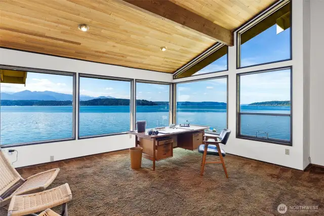 This is the loft area on the top floor taking in all the majesty the Pacific Northwest has to offer!  What a great place for an office, library or sitting area!