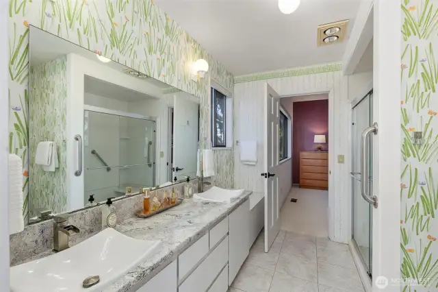 The guest suite has a Jack and Jill bath that connects to another room that can be used as a bedroom or private den/study/office.