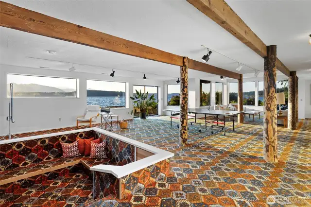 A look at the conversation pit at the fireplace.