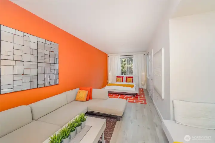 Welcome to the spacious galley-style primary bedroom.
