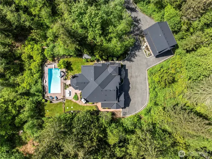 The long, private drive ensures your privacy.    Parking for a small fleet!