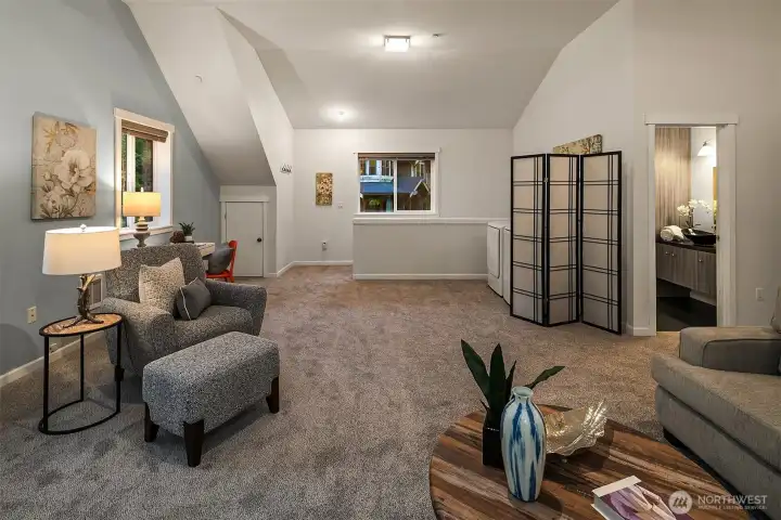Over the shop is a 1080 sf MIL apartment with 1 bedroom, a full kitchen, full bath, in unit washer & dryer, new carpet throughout and an oversized living space.  W/H new in 2022.