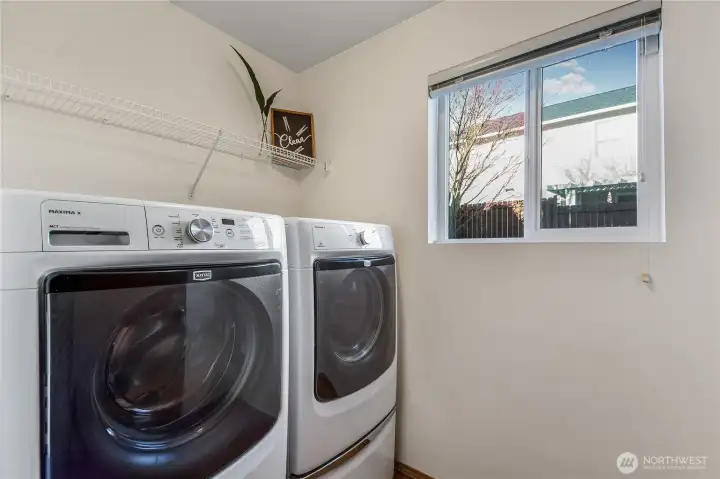 Laundry room off of guest bath.