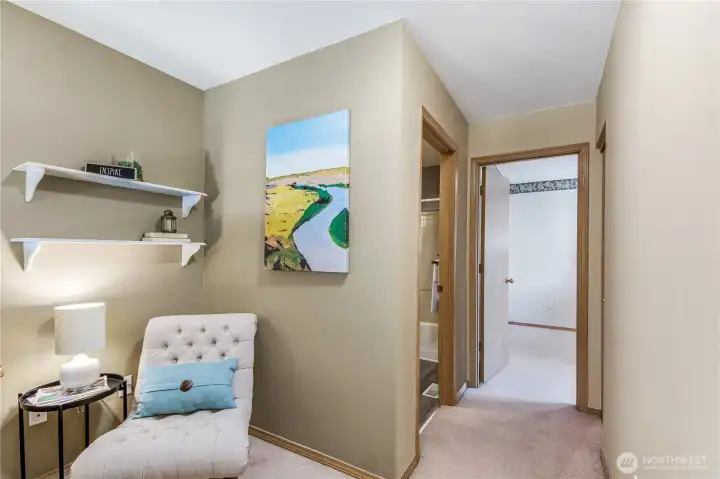 Area at top of stairs that can be used for office or reading nook