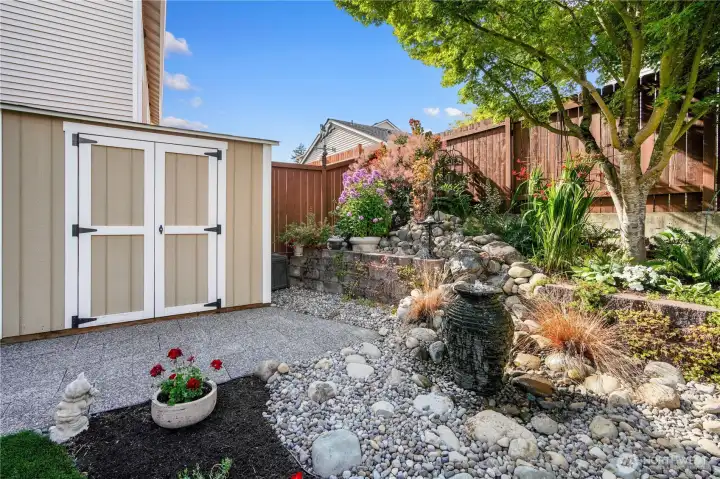 Shed in backyard for all your landscaping tools