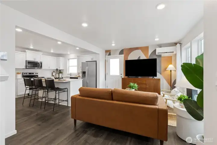 “Spacious entryway with durable laminate flooring throughout the main level.”