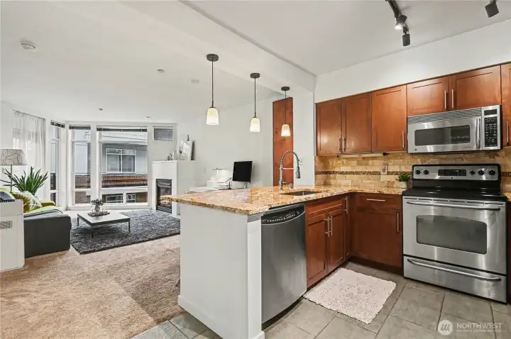 Enter into the spacious open-concept living