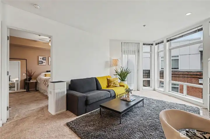 Flowing floorplan leads to a spacious bedroom