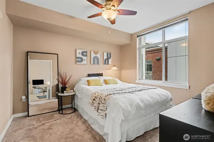 Bedroom suite with ceiling fan