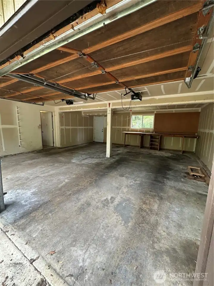 Over sized two car garage with great storage or potential to add addition living spaces