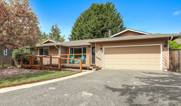 The home has a ramp for wheelchair access. Attached two car garage.