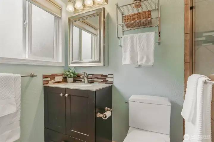The primary bathroom has heated floors.